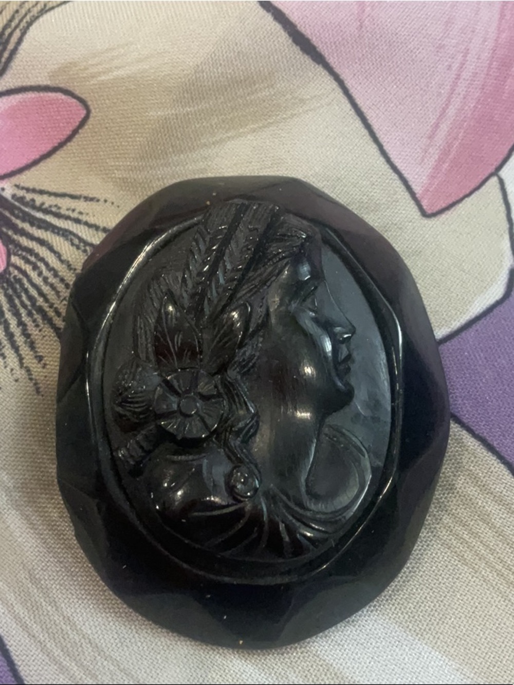 Jet black cameo mourning brooch chipped on side